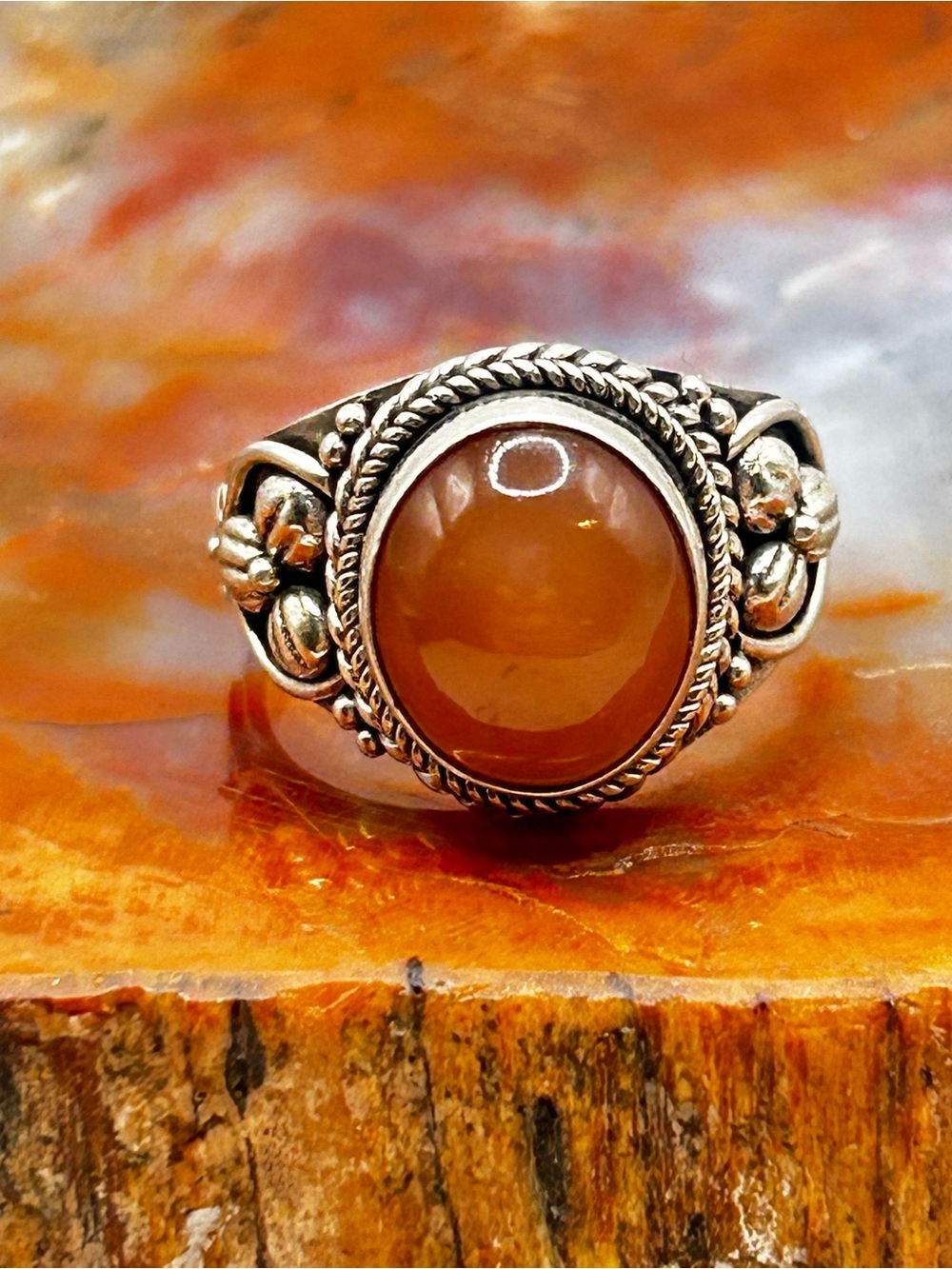 Sterling Silver Ring with Highly Reflective Orange Gemstone - Size 7